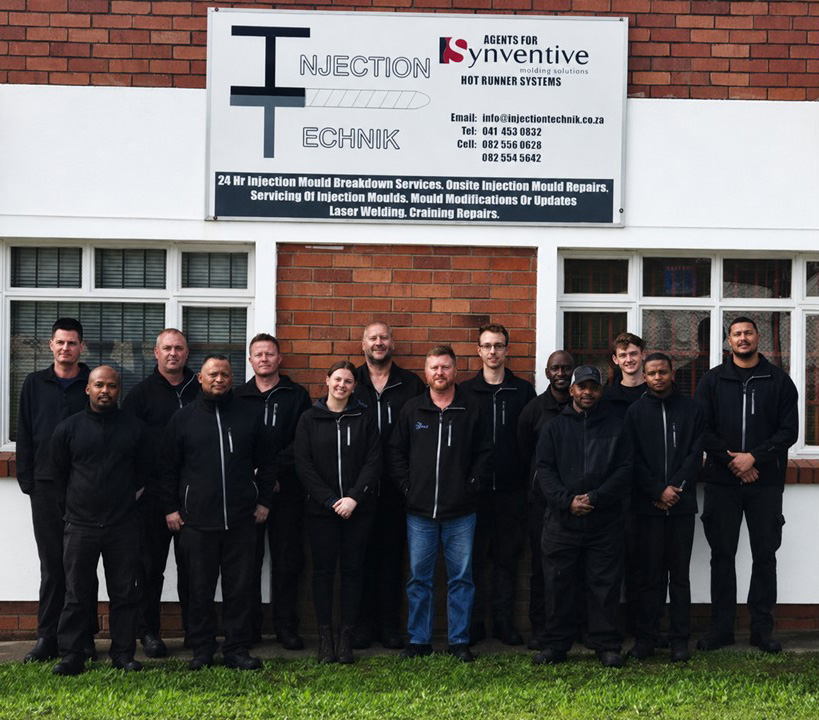 Meet the Injection Technik Team The complete Injection Technik engineering and management team at their workshop.